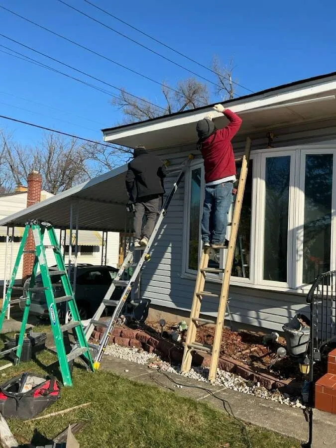 Restoration crew performing exterior repair in Huntley